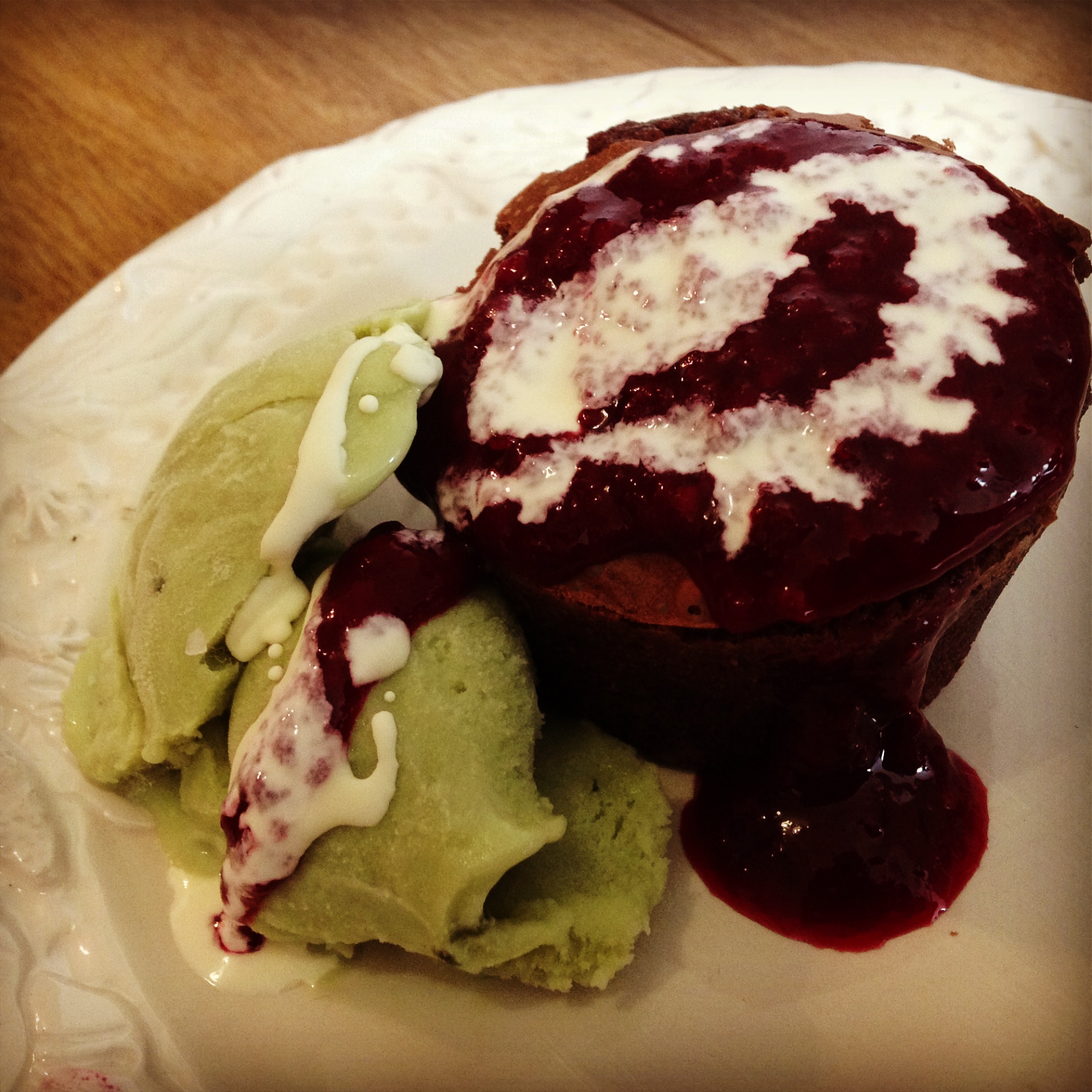 Matcha Tea Ice Cream with Chocolate Fondant, Raspberry Coulis & Cream
